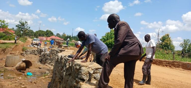 Yei commissioner inspecting Kanjoro bridge ( photo by Christopher Taharir)
