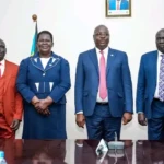 Commissioners of Yei, Lainya and Morobo counties in a group photo with state Governor Adil. File Photo (Access Radio)