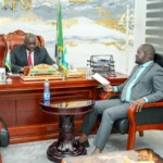Minister of Cooperatives and Rural Development, Emmanuel Khamis Richard, briefing Governor Emmanuel Adil Anthony-Courtesy