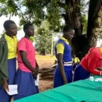 School girls in Yei recieving GESS financial aid-File Photo-Access Radio