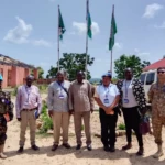 Commissioner Wani Jackson Mule and UNMISS Delegation pose for a Group photo. Photo Credit: Kenyi Joseph