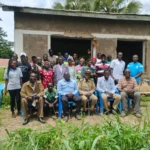 Participants pose for a group photo after the training