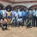Members of the steering committee pose for a photo
