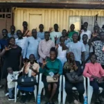 Participants pose for a group photo after the event. Photo Credit: Koneta Hub
