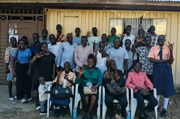 Participants pose for a group photo after the event. Photo Credit: Koneta Hub