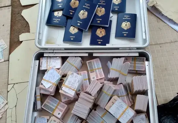 Copies of Printed Nationality cards and Passports. PHOTO CREDIT: Immigration Department, Yei River County