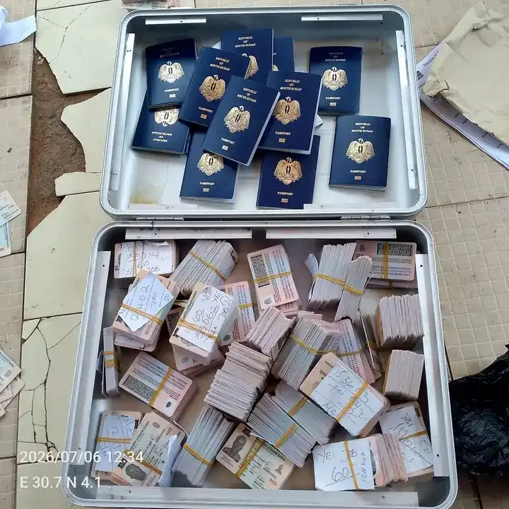 Copies of Printed Nationality cards and Passports. PHOTO CREDIT: Immigration Department, Yei River County