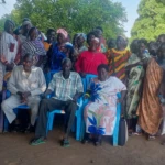 Women and girls in Gondokoro of Juba County pose for a photo during the beginning of the awareness workshop