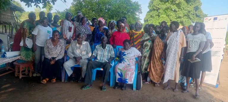 Women and girls in Gondokoro of Juba County pose for a photo during the beginning of the awareness workshop
