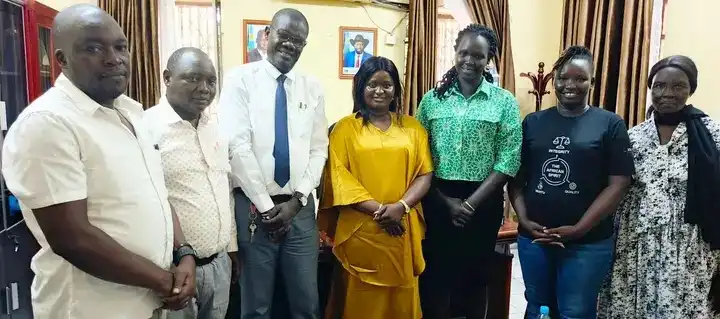 Health officials and Partner staff in a group photo. Credit: Isaac Boboya Lemi