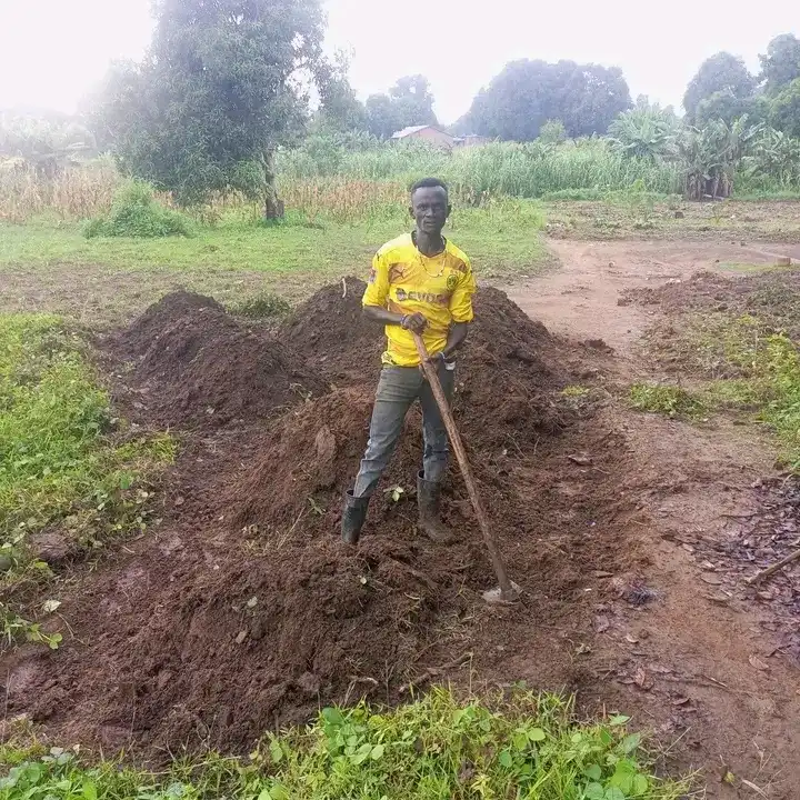 Kissenga Henry in his Farm land
