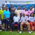 Participants pose for a group photo after the training. Photo Credit: James Innocent