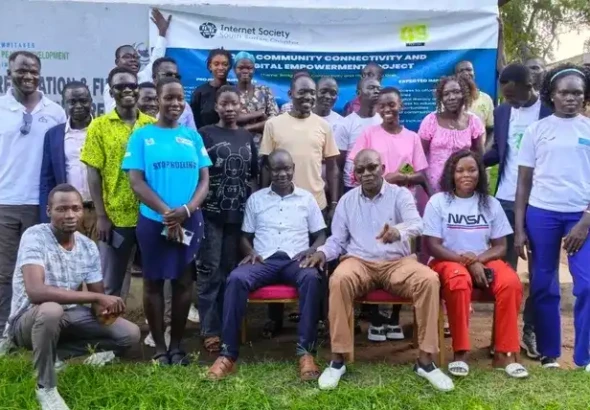 Participants pose for a group photo after the training. Photo Credit: James Innocent
