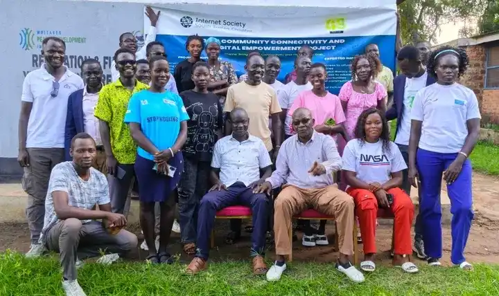 Participants pose for a group photo after the training. Photo Credit: James Innocent