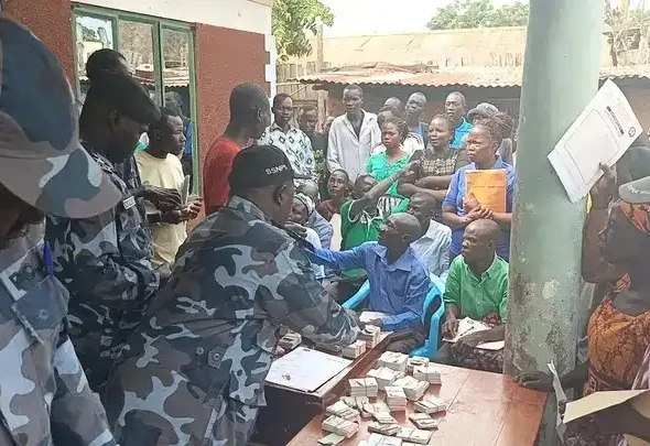 Yei Residents Collecting their National IDs. Photo by James Innocent