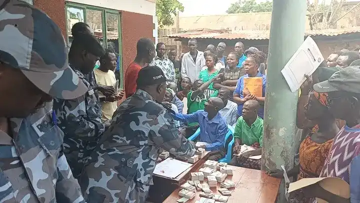 Yei Residents Collecting their National IDs. Photo by James Innocent