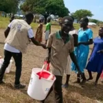 Kajo-Keji IDPS recieving WASH iteams donated by the Rescue Mission. Photo Credit-The Rescue Mission