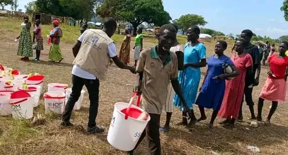 Kajo-Keji IDPS recieving WASH iteams donated by the Rescue Mission. Photo Credit-The Rescue Mission