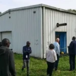 Officials assessing YECO Facility-Photo Credit-James Innocent
