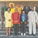 South Sudan Land Alliance members pose for a photo with Members of the Specialzed Commitee on Land on Wednesday at the Parliament Premises