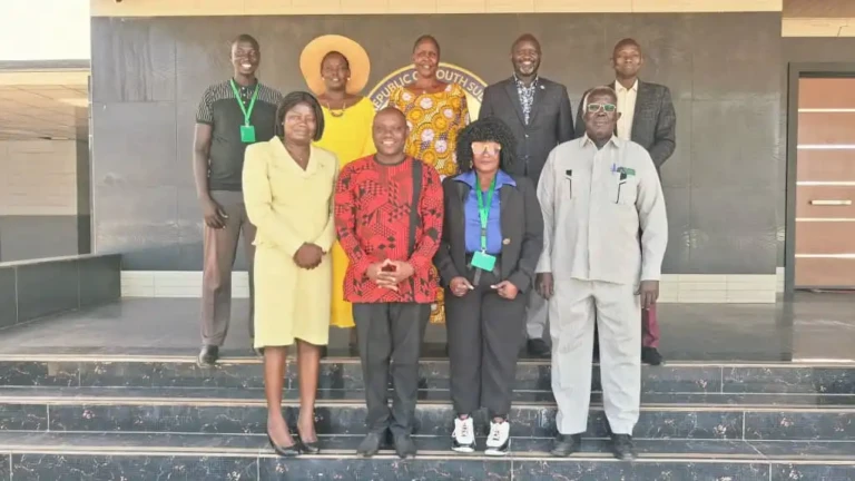 South Sudan Land Alliance members pose for a photo with Members of the Specialzed Commitee on Land on Wednesday at the Parliament Premises
