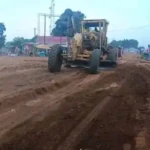 A grader working on Yerdan-Gemtel Street in Yei town