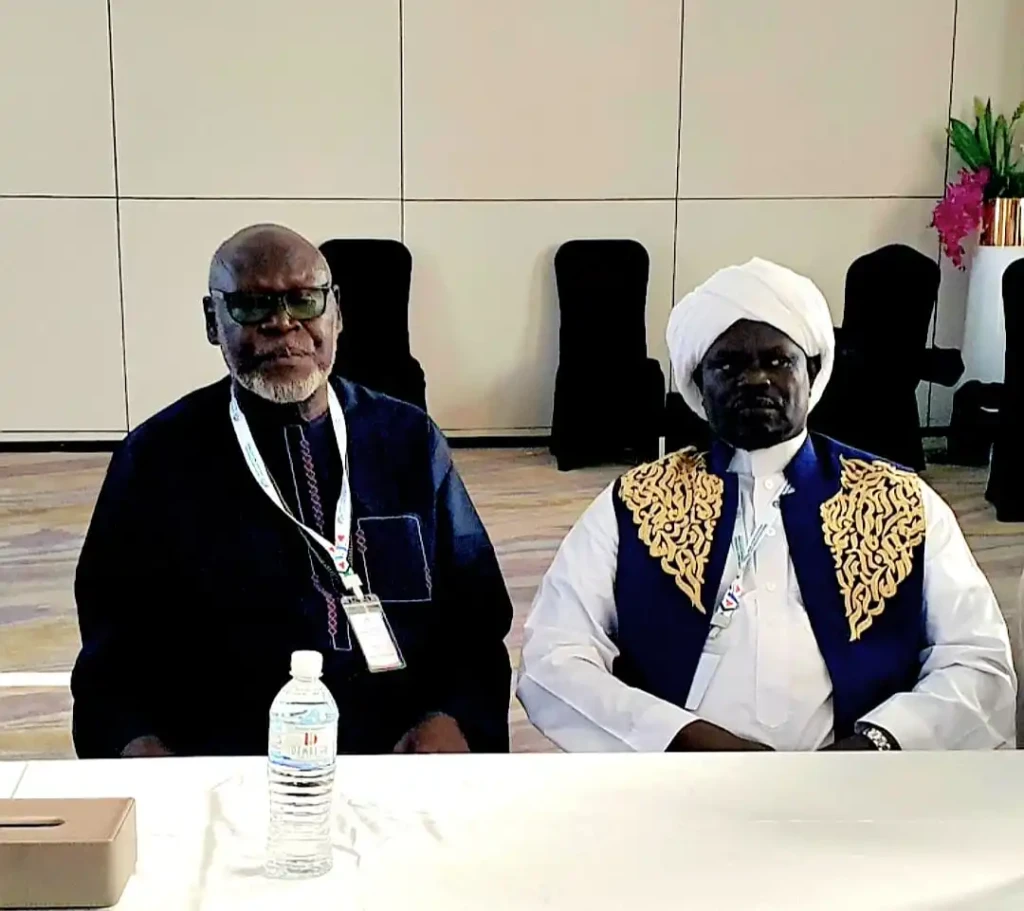 Archbishop Elias Taban and his deputy from the Muslim inter-faith religious group