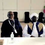 Archbishop Elias Taban and his deputy from the Muslim inter-faith religious group
