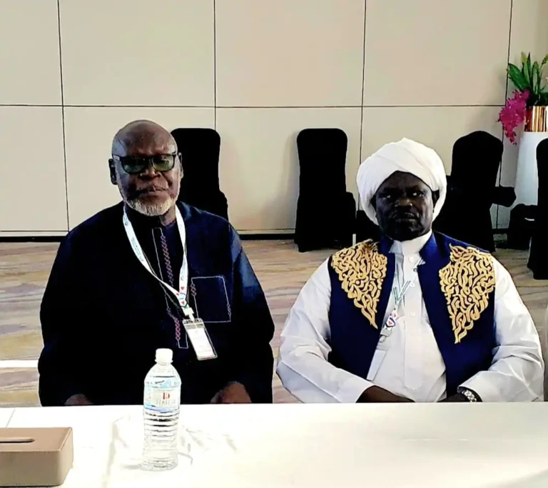 Archbishop Elias Taban and his deputy from the Muslim inter-faith religious group