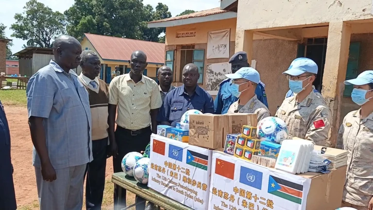 Chinese Battalion serving with the United Nation Mission in South Sudan handing over the learning materials Photo by James Innocent