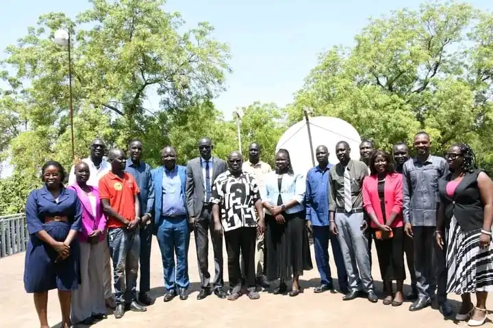 Media Stakeholders pose for a group photo after the meeting. Photo Credit-AMDISS