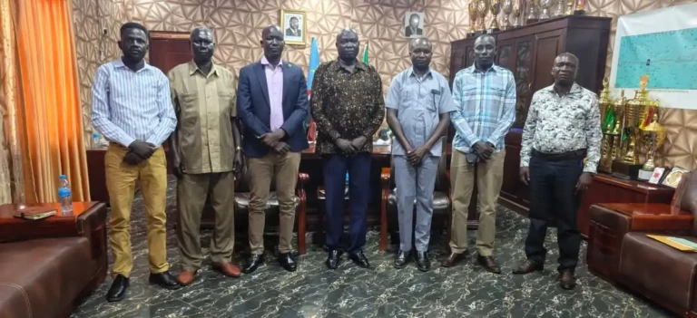 Official meeting the county commisoner in his office