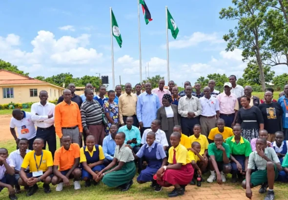 School pupils and Education officials pose for a group photo at the county headquarters-Photo Credit-Emmanuel Malish Richard