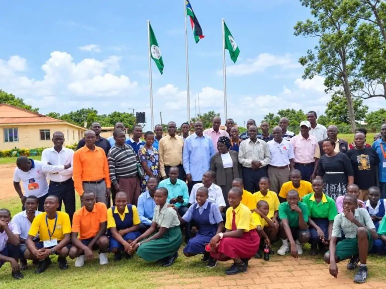 School pupils and Education officials pose for a group photo at the county headquarters-Photo Credit-Emmanuel Malish Richard