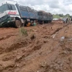 Stuck truck and Passengers along the Yei-Juba Road