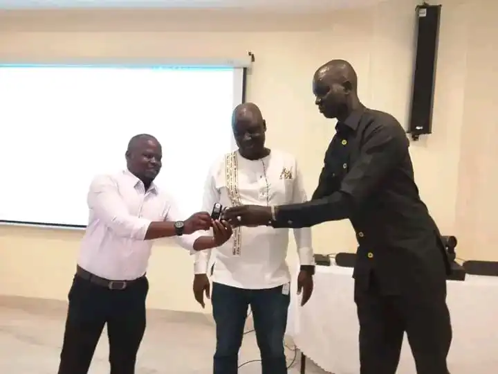 UJoSS staff recieving set of voice recorder in Juba