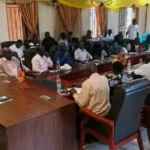 Yei Education officials and pupils during the anncoucement of the results