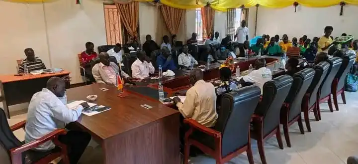 Yei Education officials and pupils during the anncoucement of the results