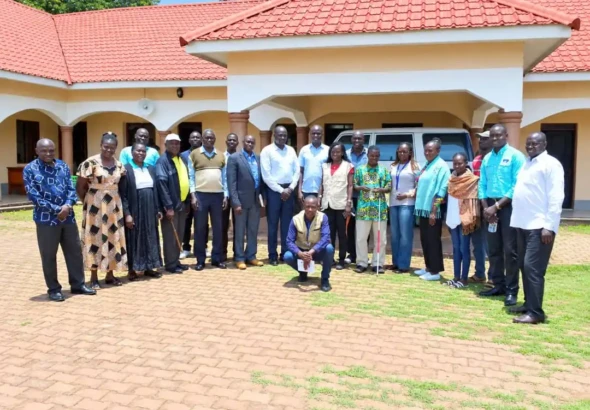 Yei stakeholders pose for a group photo after the meeting