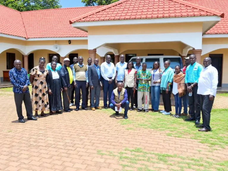 Yei stakeholders pose for a group photo after the meeting