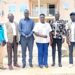 Commissioner Laku and health Partners pose for a group photo after the meeting Photo credit-Isaac Boboya Lemi