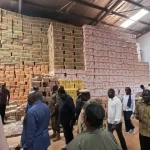 Governor Jadalla and Comissioner Ladu inspects a food store in Gumbo. Photo Credit-Press Unit-Office of the Governor