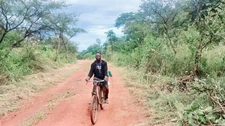 Mapoko resident rides his bike into Yei town. PHOTO CREDIT-Christopher Taharir