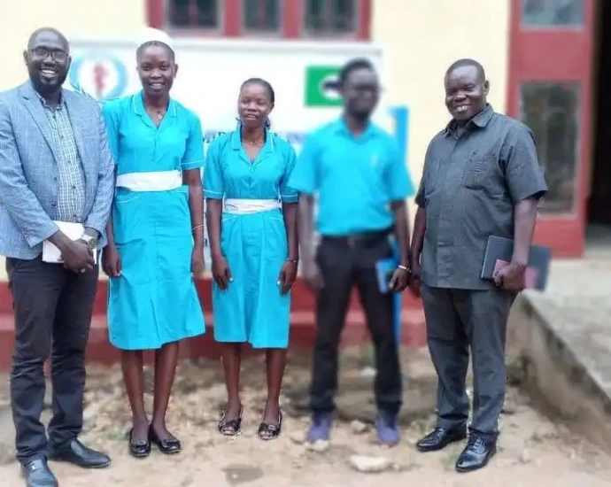 Morobo Commissioner (RIGHT) Begins Duties With Visit to Health Students